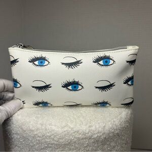Rodan & Fields eye lash print cosmetic pouch.  Like new condition.